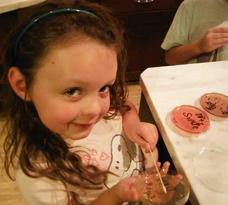 Girl Placing Bacterial Sample on TSY Agar